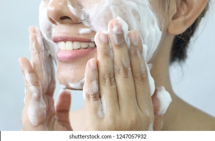 Close Up Asian Woman Smile And Washing Face By Make Bubble Facial Foam And Cleansing Her Face Skin