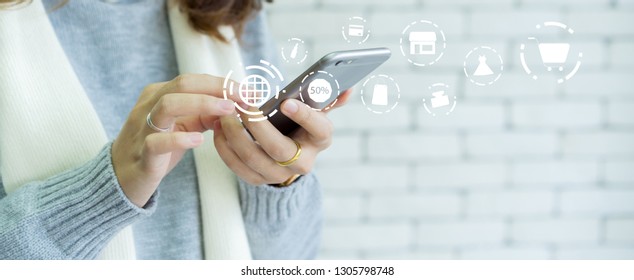close up asian woman using smartphone for choosing item in marketplace on store website with virtual interface of shopping online (b2b) technology concept