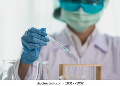 Close Up Of Asian Women Scientist With Test Tube Making Research In Clinical Laboratory, Science And Chemistry Concept, Medical Technologist