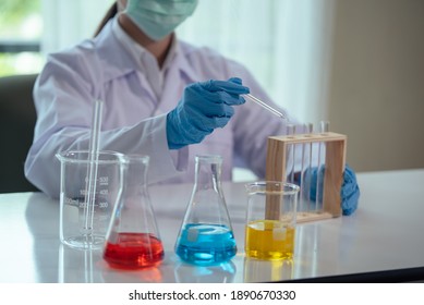 Close up of Asian women scientist with test tube making research in clinical laboratory, Science and chemistry concept, Medical technologist