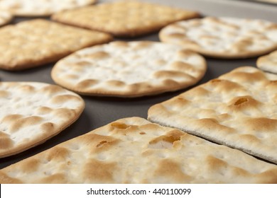 Close up of assorted crackers on a baking tray