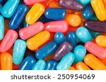 Close up of assorted multicolored candies.  