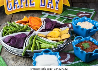 Close Up Of Assorted Vegetable Chips -  Football Season Party Vegetarian Plate And Assorted Dips.