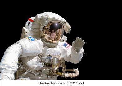 Close up of an astronaut isolated on black background - elements of this image are provided by NASA - Powered by Shutterstock