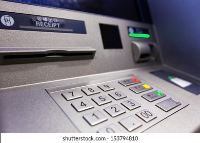 Close up of an ATM machine. Keyboard and insert card 