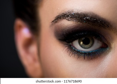 close up of attractive girl with fashionable makeup on eye, isolated on grey - Shutterstock ID 1176718690
