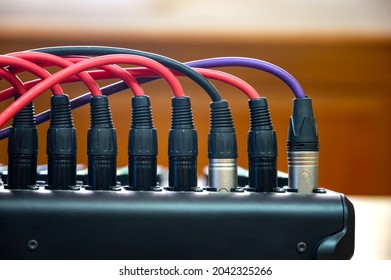 Close up Audio cable with XLR connectors for microphones and professional audio equipment.Connection sockets Analog amplifier.