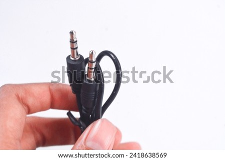 Close up audio jacks cable plugged into mixer console. XLR audio cable