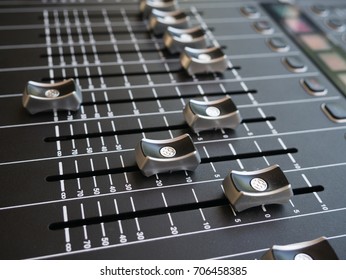 Close up audio mixing control panel