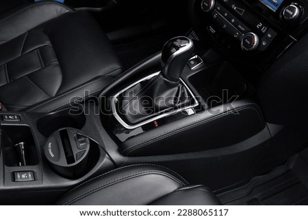 Close up of the automatic gearbox lever, black interior car, Automatic transmission gearshift stick. Closeup a manual shift of modern car gear shifter.