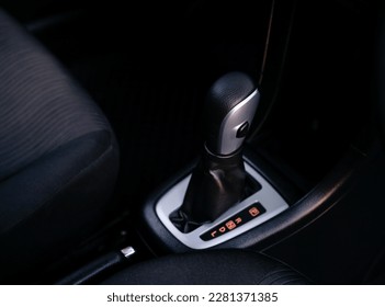close up of automatic transmission gear lever in car. The automatic gear lever shows the gear shift position in a car.selective focus,automatic transmission car