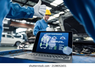 Close Up Of Automotive Mechanic Running Diagnostics Software On Tablet. Asian Young Vehicle Service Manager Worker Work In Mechanics Garage, Check And Maintenance To Repair The Engine Car In Workshop.