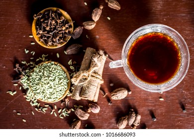 Close Up Of Ayurvedic Green Tea With All Of Its Ingredients I.e Black Pepper,cinnmon,ginger & Fennel Seeds.