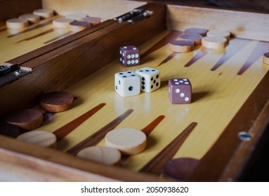 close up of backgammon game with dice