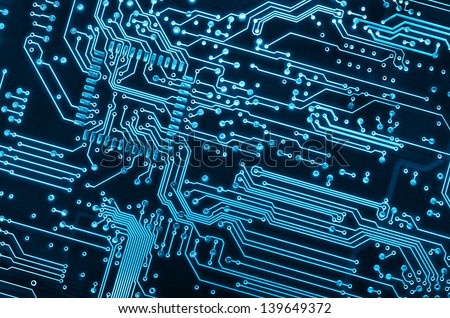 close up background of a blue electronic circuit board
