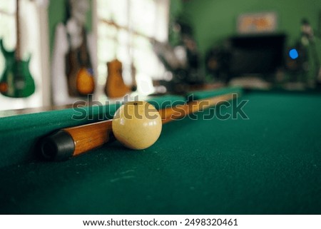 Close up background image of billiard balls on green table in pool club copy space