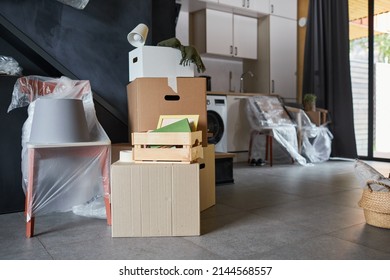 Close Up Background Image Of Messy Cardboard Boxes Filled With Decor In New Home, Family Moving And Relocation Concept, Copy