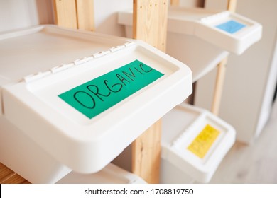 Close Up Background Image Of Plastic Bin Labeled For Organic Waste, Home Sorting And Storage Concept, Copy Space