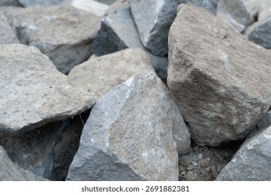 Close up Background of Rough Angular Gray and Brown Construction Rocks