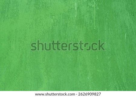 Close up background rough texture of abstract surface painted green