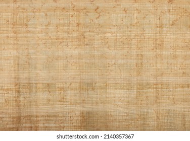 Close up background texture of ancient Egyptian papyrus or byblos paper reed document - Shutterstock ID 2140357367