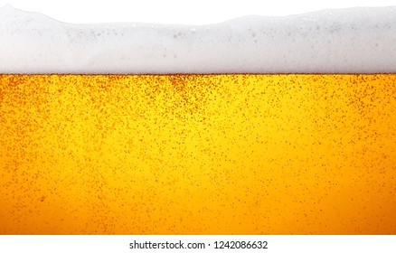 Close up background texture of lager beer with bubbles and froth in glass, low angle side view - Shutterstock ID 1242086632