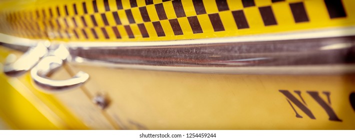 Close Up Background Vintage Panoramic Web Banner Photograph Of The Side Of New York City Yellow Taxi Cab