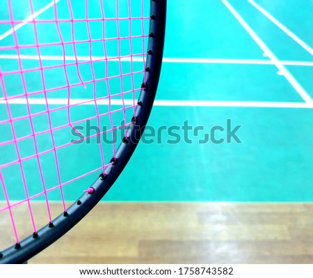Close up badminton racket torn ligament damage