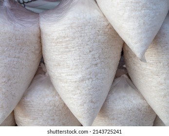 Close Up Bag Of White Sea Salt Stacked For Sale
