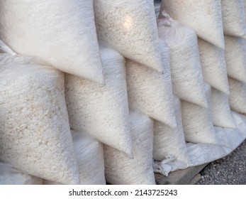 Close Up Bag Of White Sea Salt Stacked For Sale