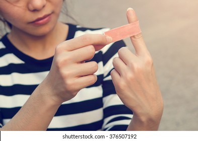 Close up bandage on an injured finger, outdoor.