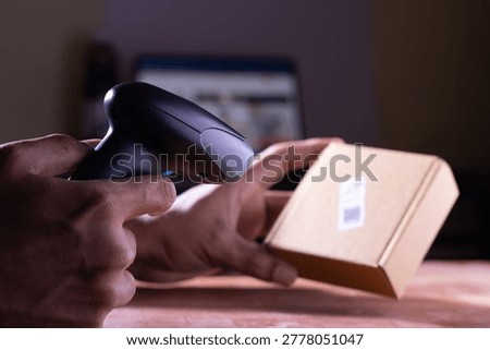 Close up barcode scanner on the package brown box,Inspection of 