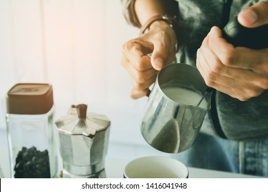 Close- Up , Barista Is Steaming, Milk Frother Latte Art In Coffee Mug At Home In The Morning With Sunset