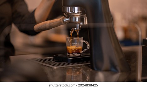 Close Up Barista Under Using Coffee Making Machine At Cafe Restaurant To Make Coffee Order  Customer Request Concept.