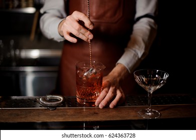 close up of bartender making a cocktail