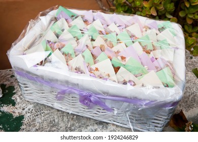 A Close Up Of A Basket Of Wedding Party Favors.