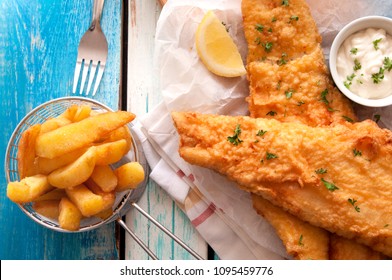 Close Up Battered Fish And Chips With Mayonnaise Sauce