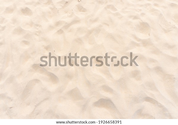 Close up beach sand texture. Sand nature
pattern. Beach sand texture in summer
sun.