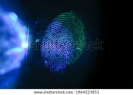 Close up beautiful abstract multi colored fingerprint on  background texture for design. Macro photography view.