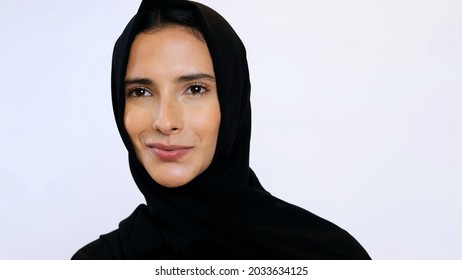 Close up of beautiful Authentic looking Emirati Arab female national Middle Eastern woman wearing Abaya and Hijab in Dubai