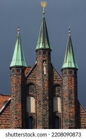 Close Up Of Beautiful 
Brick Gothic Towers Of The Medival Holsten Gate.