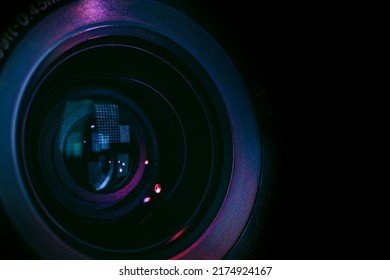 Close up Beautiful camera lens with multi colored light. Background pattern for design.	 - Shutterstock ID 2174924167