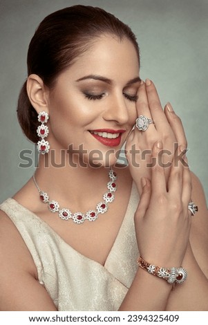 close up of a beautiful Indian model wearing diamond necklace and ring