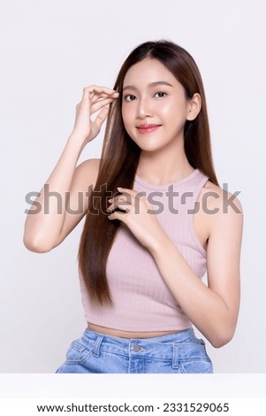 Close up beautiful longhair asian woman model with natural make up and clean fresh skin isolated on white background.