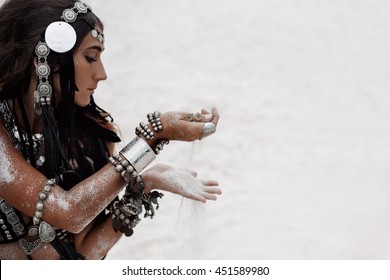 close up of beautiful tribal woman. Hands of ethnic dancer. Soft focus - Powered by Shutterstock