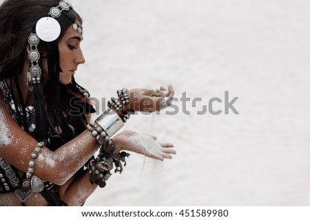 close up of beautiful tribal woman. Hands of ethnic dancer. Soft focus
