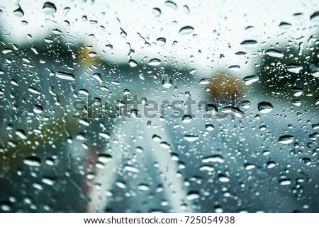 Close up beautiful water drops on auto glass car texture and background for design or architect, Heavy rain