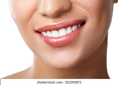 Close Up Of Beautiful Wide Smile Of Young Fresh Woman With Great Healthy White Teeth. Isolated Over White Background