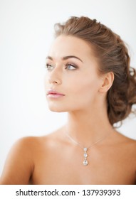 Close Up Of Beautiful Woman Wearing Shiny Diamond Necklace