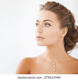 Close Up Of Beautiful Woman Wearing Shiny Diamond Necklace